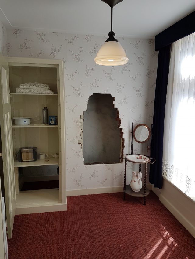 Hole in a wall in a room